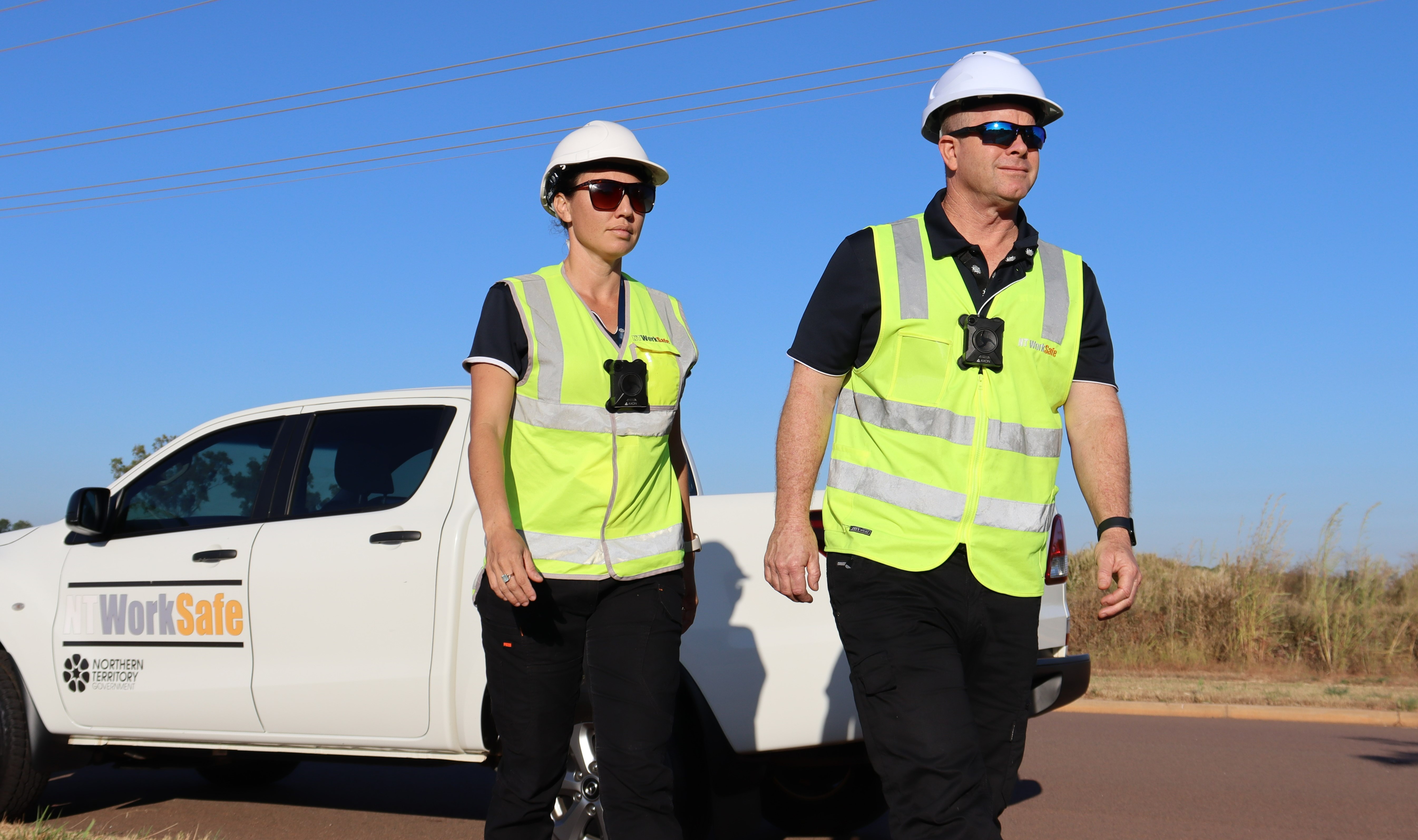 The photo shows NT WorkSafe inspectors wearing body worn camera as they conduct their workplace inspections.