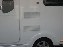 Image shows the refrigerator flue terminal on an RV