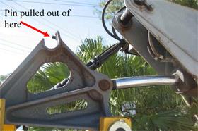 Image shows a close up of the failed linkage.