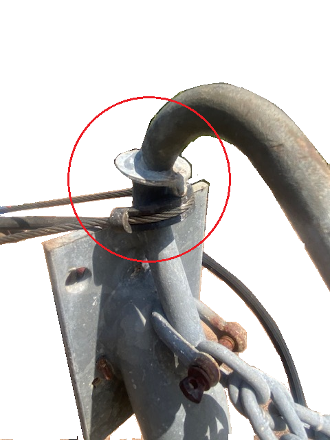 Figure 2: Stainless steel braided wire attached to metallic gooseneck riser hook, attached to metal roof.