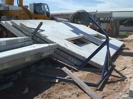 Close up image showing the collapsed steel rack.