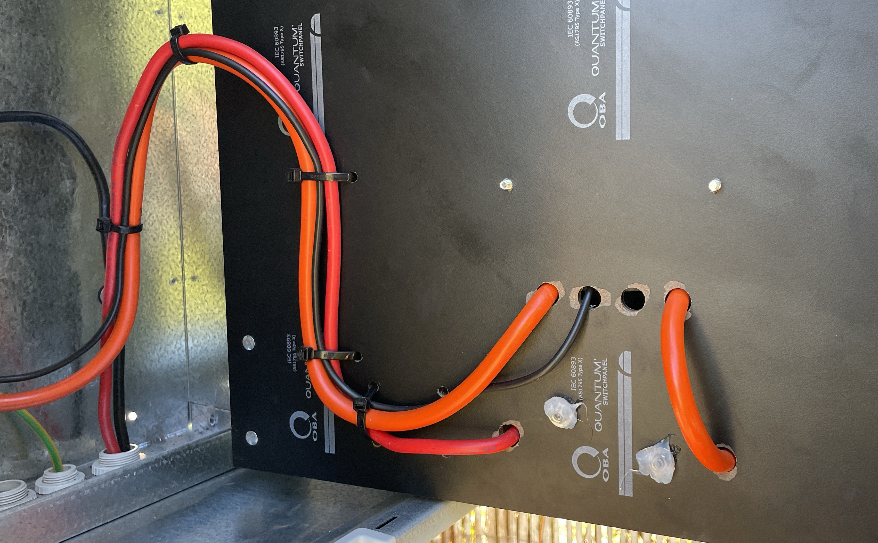 The image shows flexible conductors correctly fixed to allow for hinged movement.
