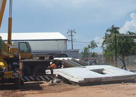 Eleven concrete precast panels weighed approximately 100 tonnes. Image shows the eleven precast concrete panels on the ground