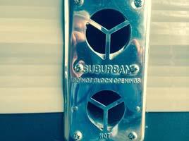 Water heater flue terminal on an RV. Image show a water heater flue terminal on an RV