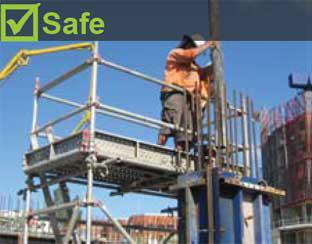 A scaffold platform is one option of providing a safe work area. Image shows worker standing on a scaffold platform