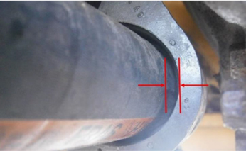 Aftermarket smaller diameter hose installed in OEM clamp grommet. The hose must be a firm fit to prevent hose pulsation and movement. Aftermarket smaller diameter hose installed in OEM clamp grommet. The hose must be a firm fit to prevent hose pulsation and movement.