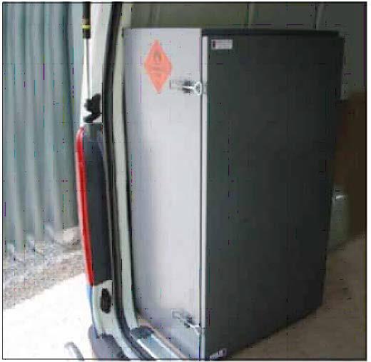 Image shows a installed gas cabinet in the back of a van.